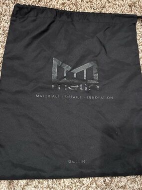 Melin Black Drawstring Hat Sleeve Bag